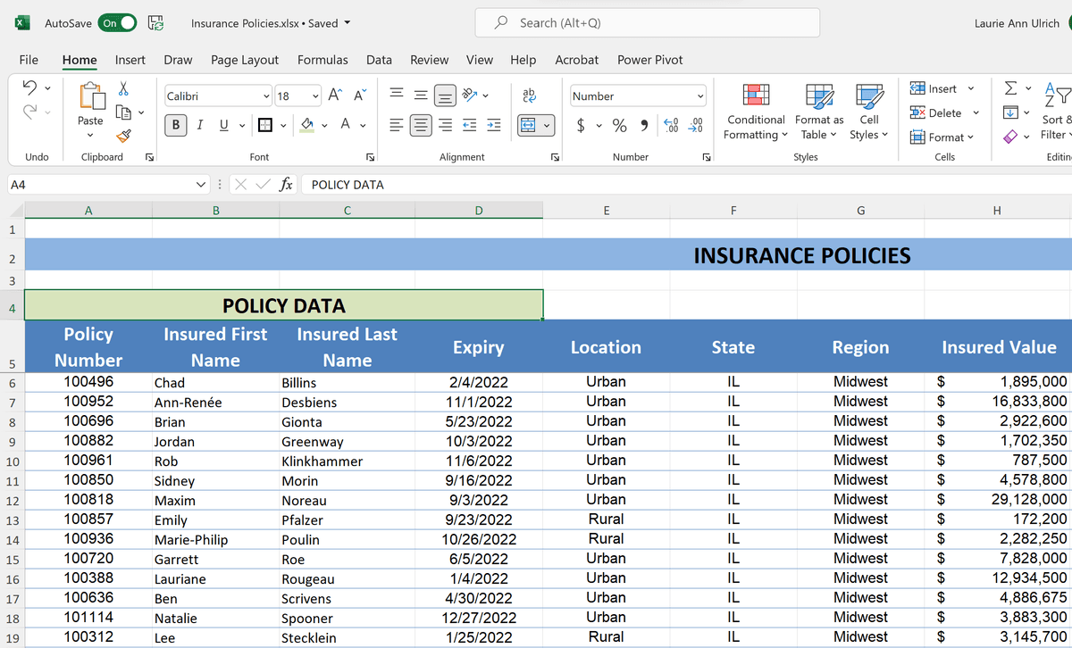 Excel report section heading merged and centered across four columns