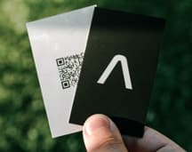 Print advertising materials including business cards, coasters, and flyers for designers